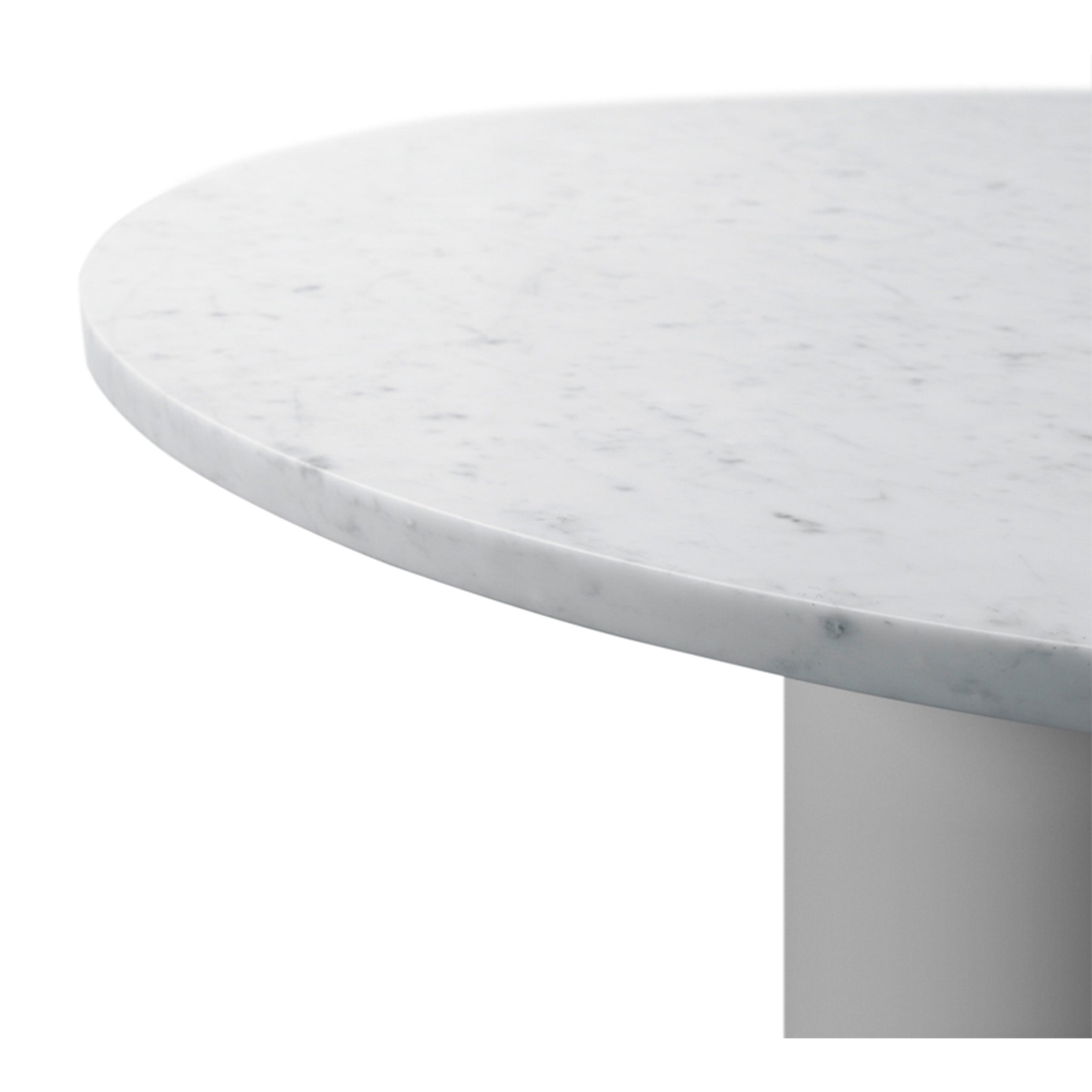 Close-up of the TA20 HIROKI by E15, a sculptural round tabletop in white marble with subtle gray veining. Its smooth edge complements a minimalist white background, highlighting the clean and elegant design—perfect for any modern space.