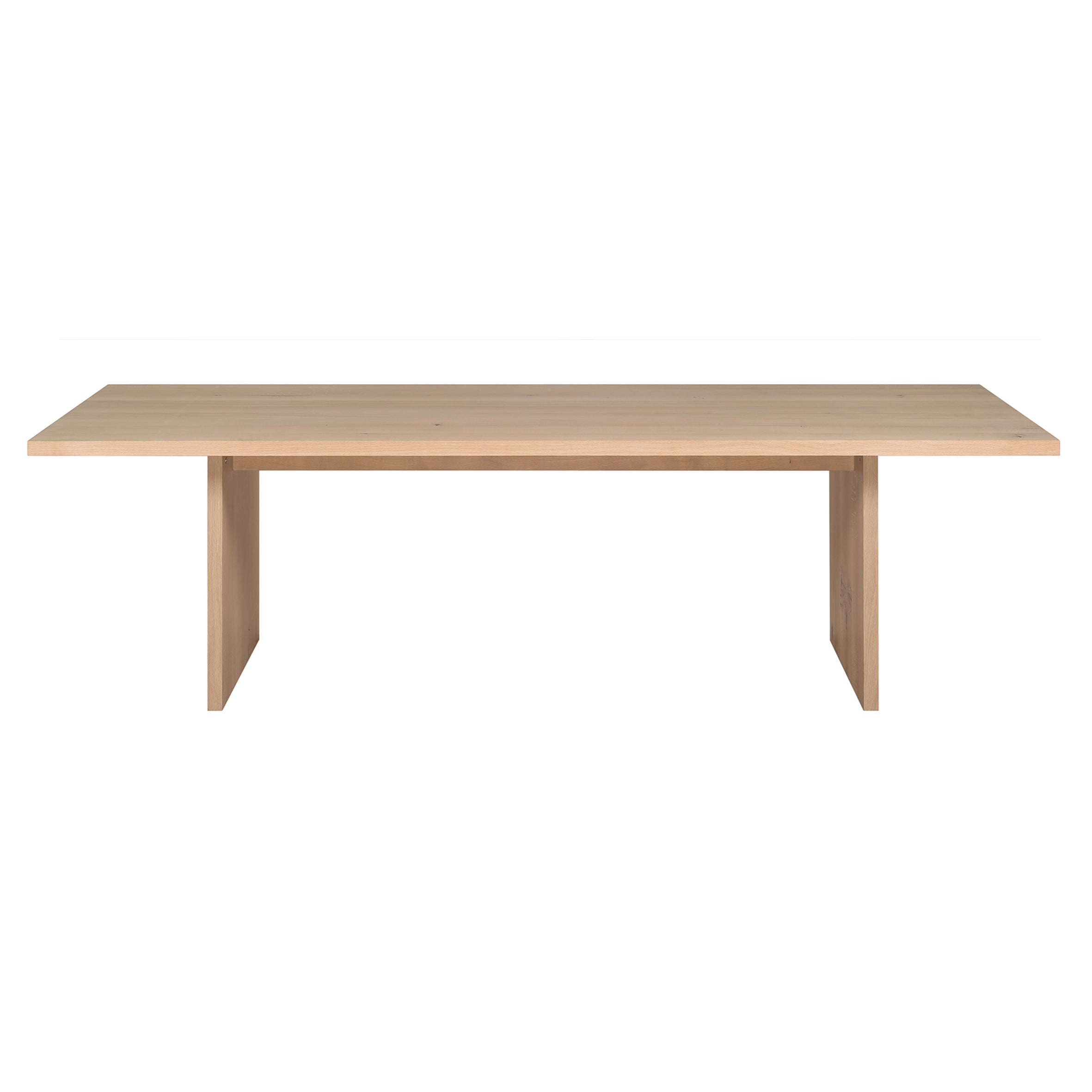 The TA24 ASHIDA by E15 is a minimalist, rectangular wooden table crafted using Japanese carpentry techniques. It features a flat tabletop, two vertical support sides, and a light natural finish with clean lines and no visible adornments.