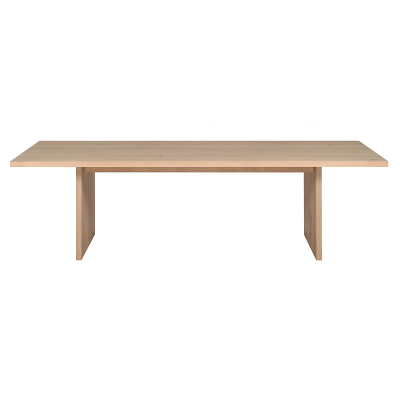 The TA24 ASHIDA by E15 is a minimalist, rectangular wooden table crafted using Japanese carpentry techniques. It features a flat tabletop, two vertical support sides, and a light natural finish with clean lines and no visible adornments.