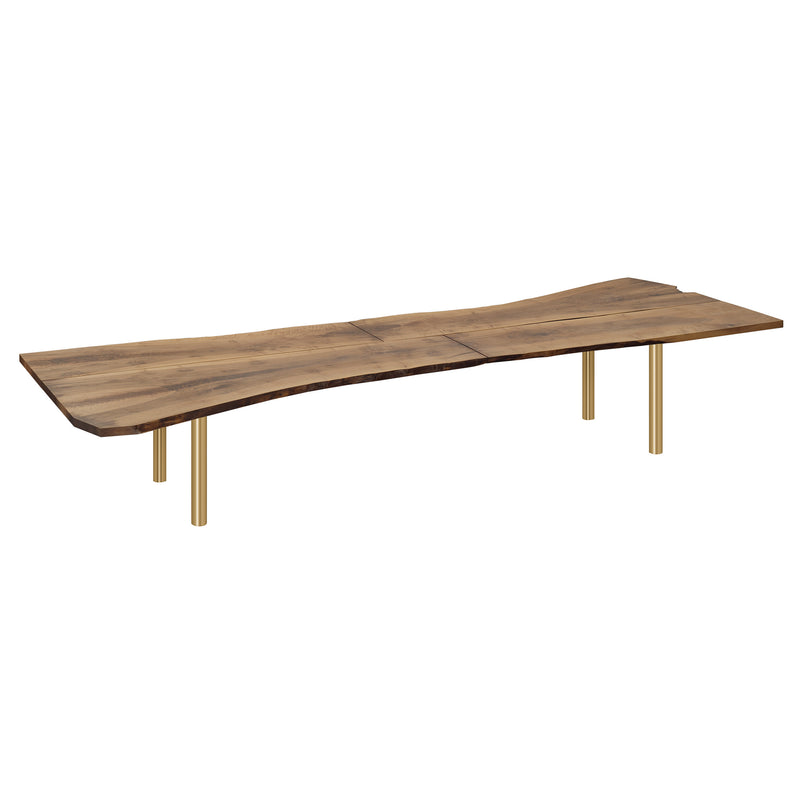 Introducing the E15 TRUNK table—a wooden coffee table made from European walnut with a live edge design and four slender metal legs. Its elongated surface displays natural grain patterns in a warm brown hue, creating a stunning sculptural piece.