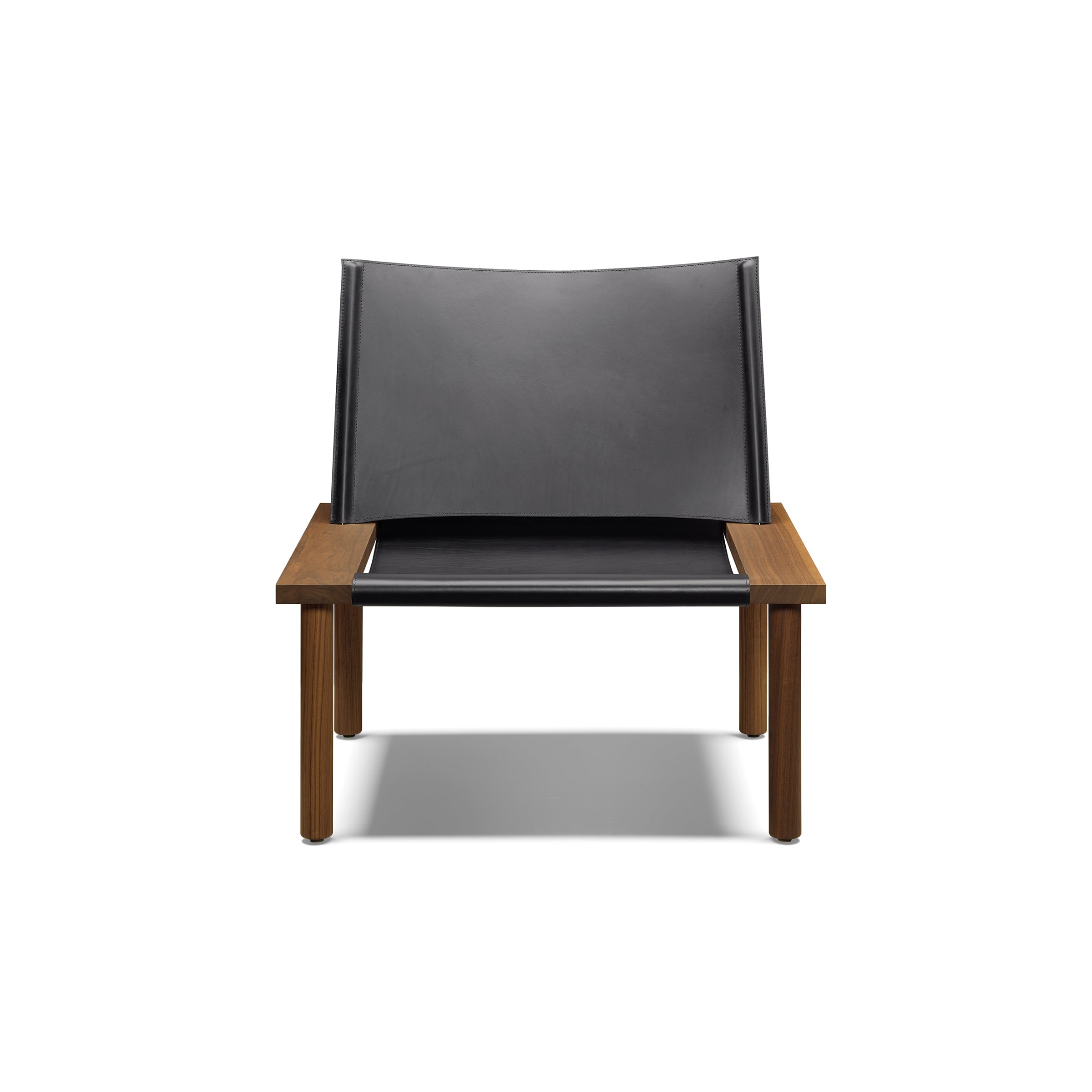 The EC06 ILMA Lounge Chair by E15 features a sleek black harness leather seat and backrest. Its solid wood frame and armrests enhance its modern, stylish design, with natural materials that beautifully stand out against a white background.