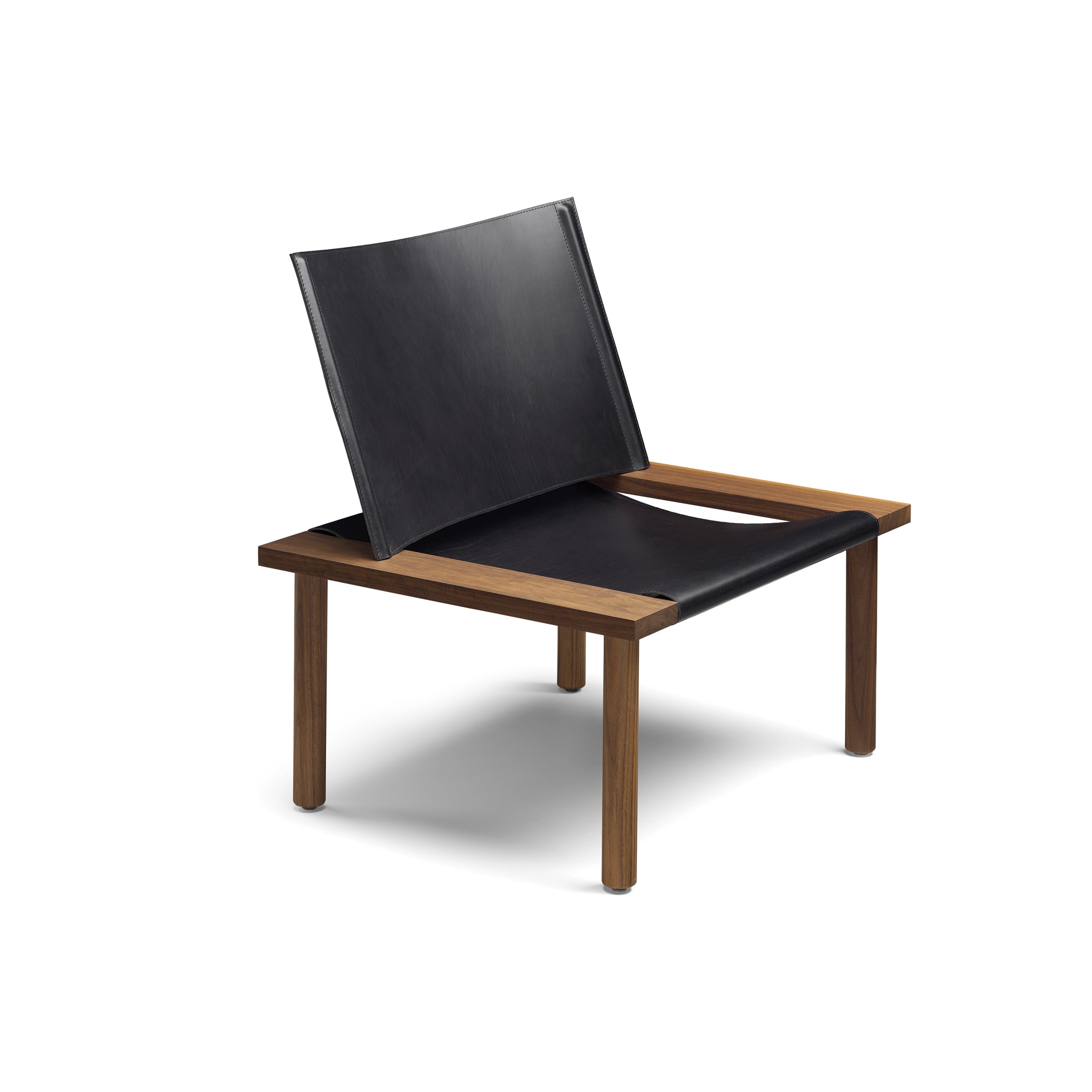 The E15 EC06 ILMA Lounge Chair features a minimalist design with a solid wood frame and sleek harness leather seat and backrest, blending natural materials with contemporary style through clean lines and a low-profile structure.