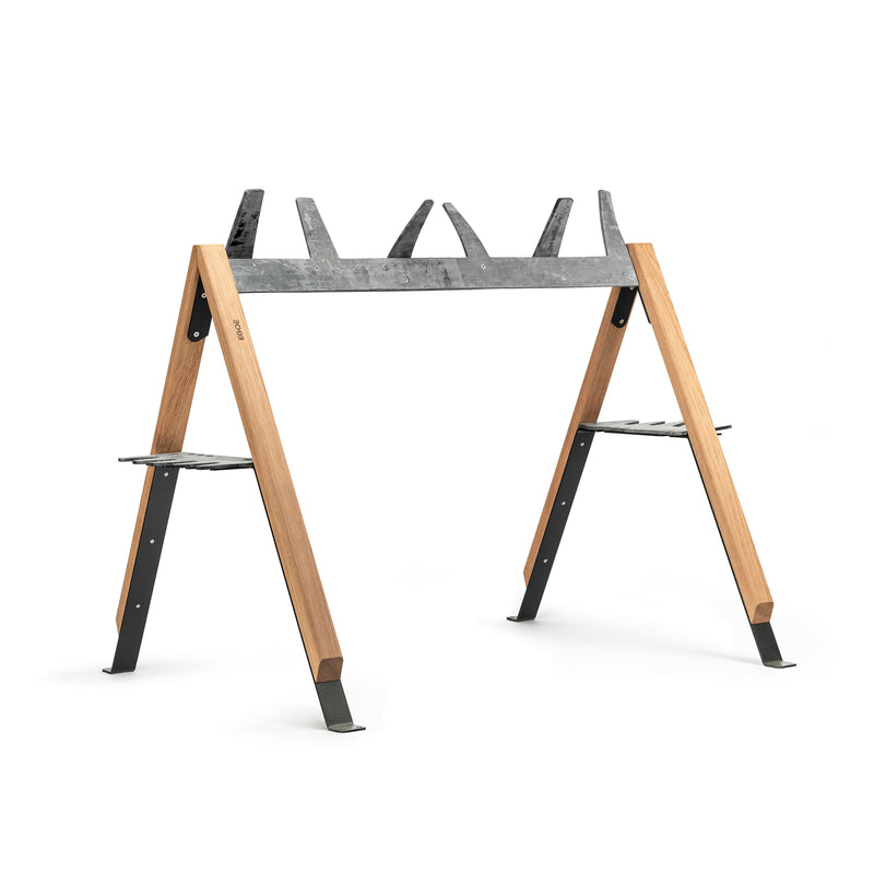 The Cabra Ski and Bike Rack by Egoe features a wooden and metal design with triangular supports and inclined legs. Sturdy metal brackets hold wood securely, making it perfect for cutting logs while also serving as an equipment protector with its modern industrial look.