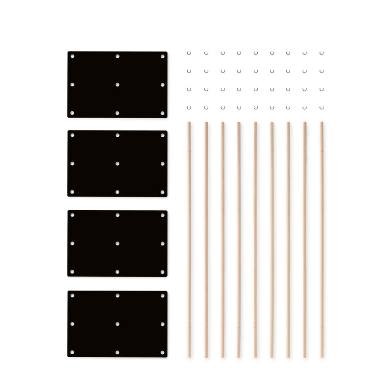 The image showcases a minimalist Moormann design of the Es product, featuring four black rectangular pieces with holes, ten beige poles, and forty small metal hooks neatly arranged on a plain white background.