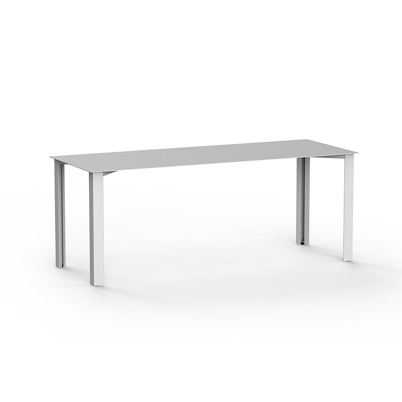 The PILON Table by Echtstahl is a minimalist rectangular gray dining table made of sheet steel. It features four straight legs, height-adjustable feet, and is showcased against a white background.