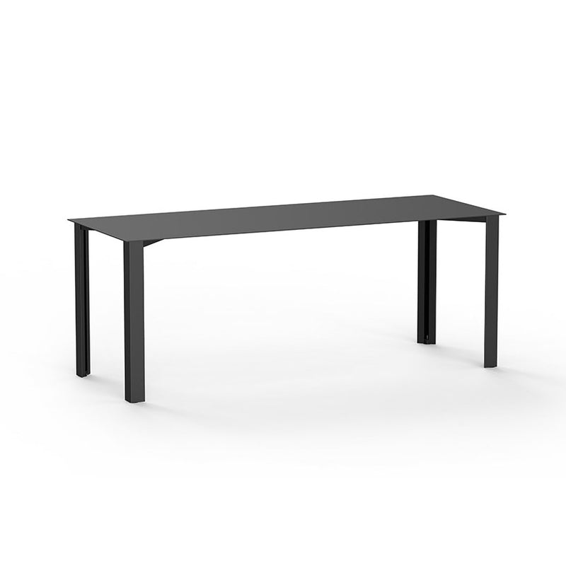 The PILON Table by Echtstahl is a sleek, minimalist black rectangular dining table with sheet steel construction and a smooth surface. It features four straight legs and height-adjustable feet, elegantly set against a plain white background.