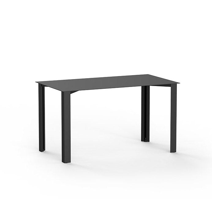 The PILON Table by Echtstahl is a minimalist black rectangular dining table with sheet steel construction, four straight legs, and height-adjustable feet, shown against a plain white background.