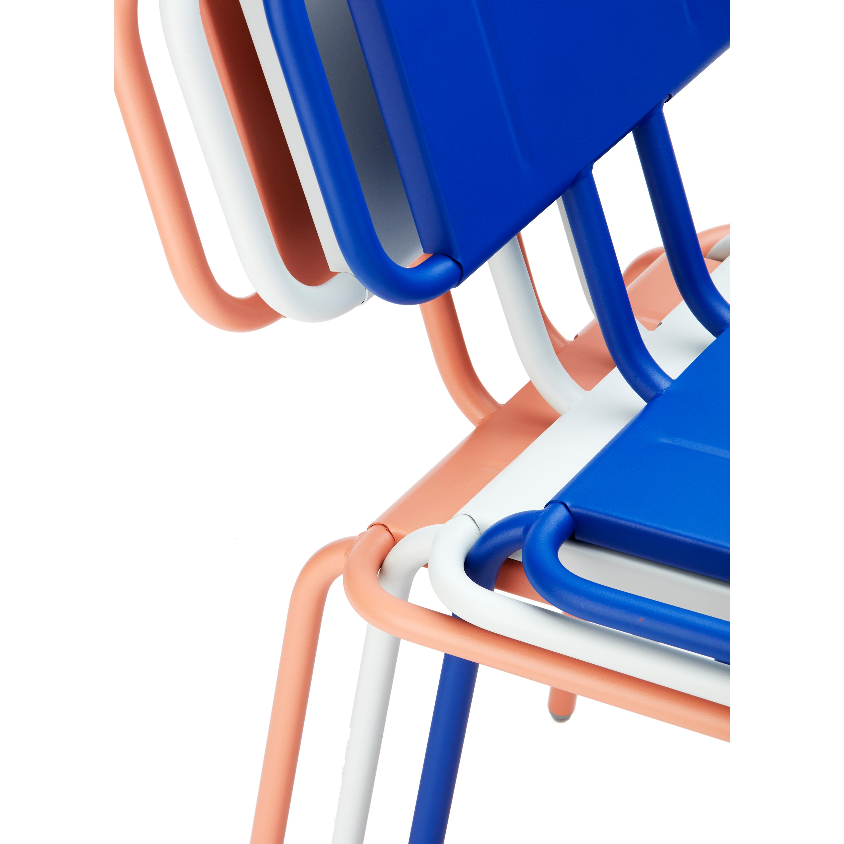 Close-up of three Hama Lounge Chairs by Echtstahl featuring blue seats and backs. The stackable frames are crafted from tubular metal in peach, white, and blue, showcasing a modern and minimalistic design.
