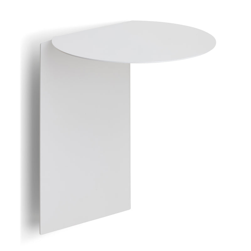 The Plateau round by Echtstahl is a minimalist wall-mounted shelf featuring a vertical rectangular backplate and a round top surface, crafted from powder-coated steel. Its sleek, modern design adds sophistication while casting a soft shadow on the wall.