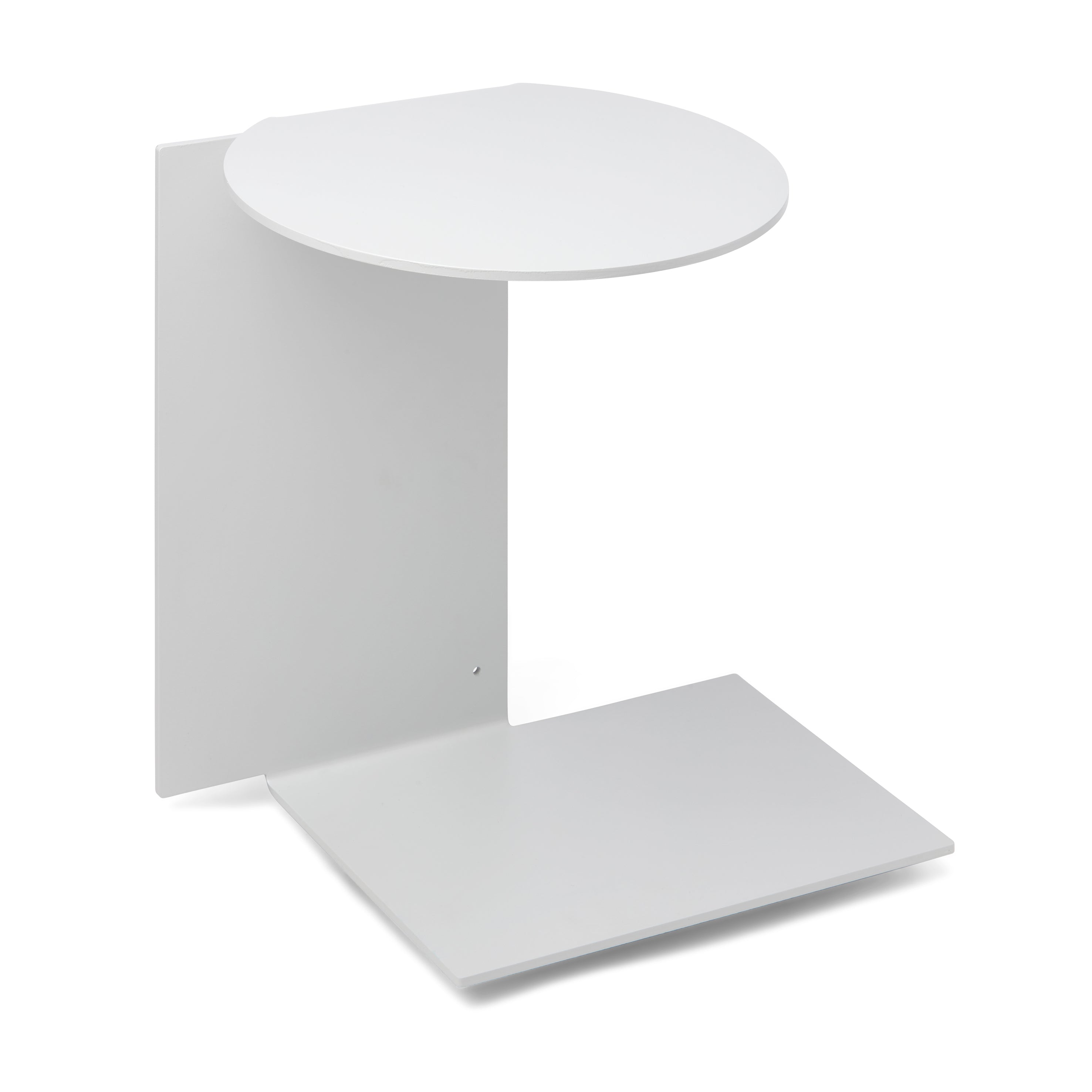 The Plateau side table by Echtstahl is a minimalist piece made from powder-coated steel, featuring an L-shaped design with a round top and square bottom platform. Its sleek, modern look is ideal for displaying small items or decor, making it a versatile addition to any space.