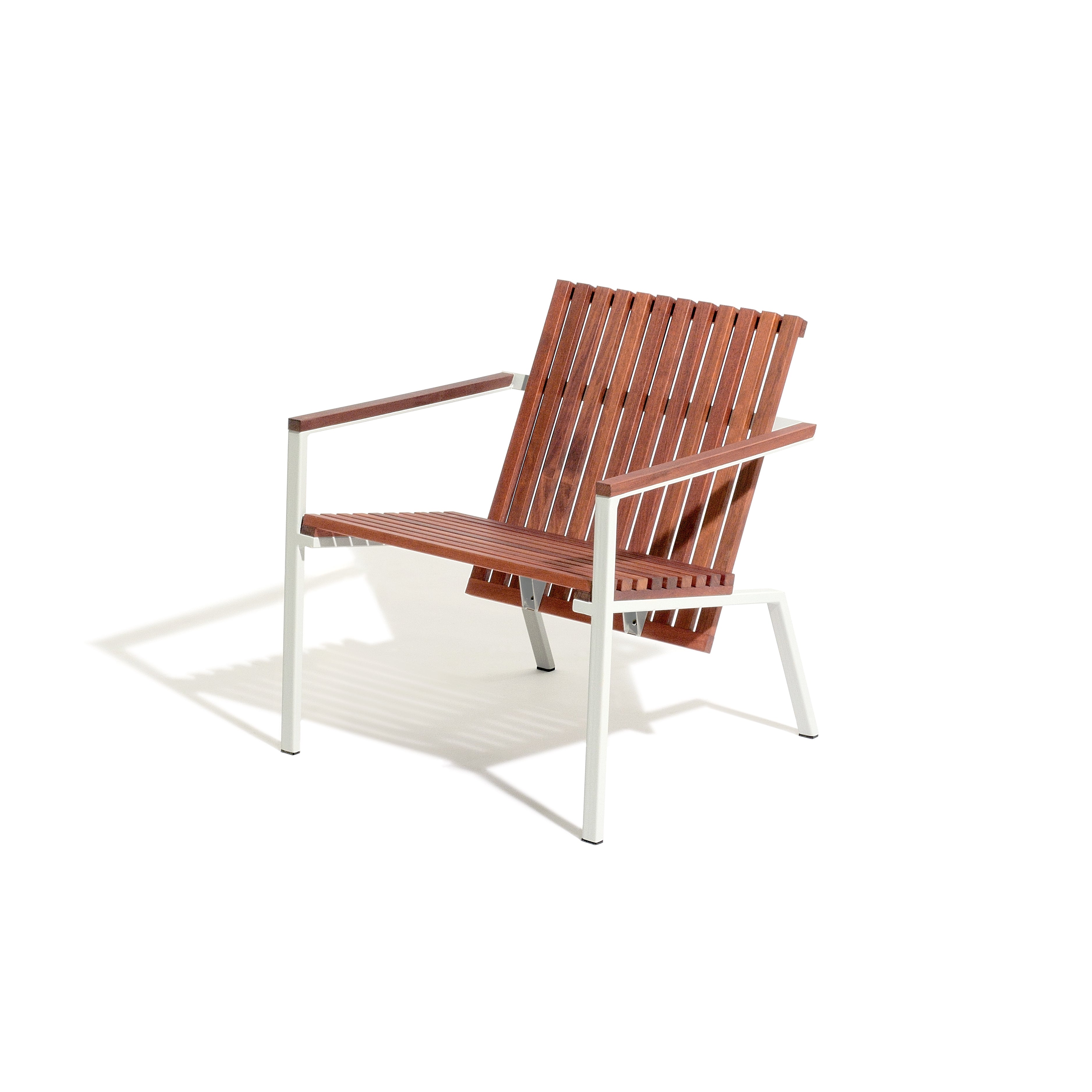 The Axis Lounge Armchair by Egoe features modern, minimalist design with horizontal tropical wood slats for the seat and backrest. Its sleek, zinc-plated steel frame contrasts against a white background, highlighted by left-cast shadows.