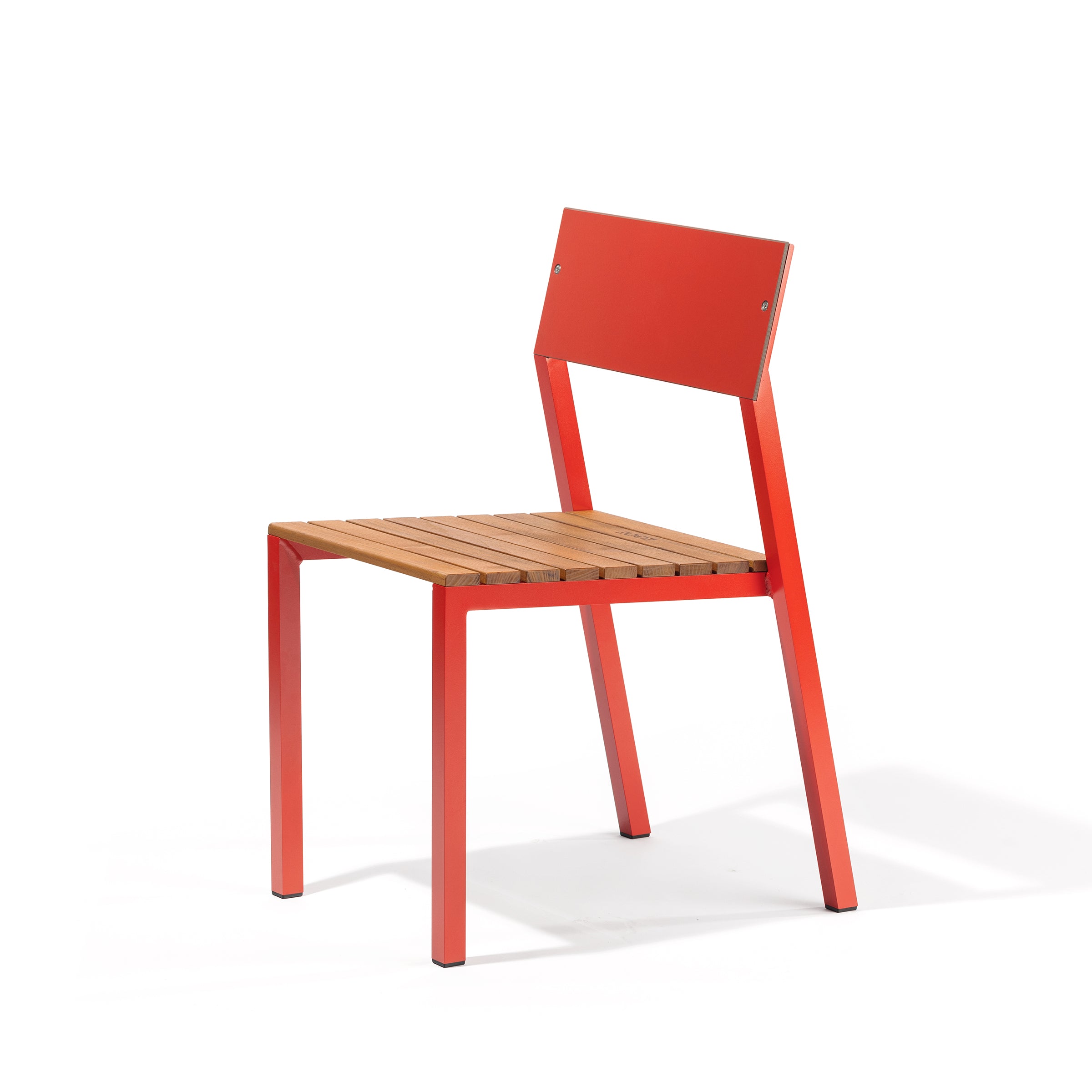 Introducing the Cora Chair by Egoe: a modern masterpiece with a red metal frame, wooden slatted seat, and matching backrest. This minimalist piece exudes contemporary charm, perfect as outdoor furniture or stackable chairs for versatile use.