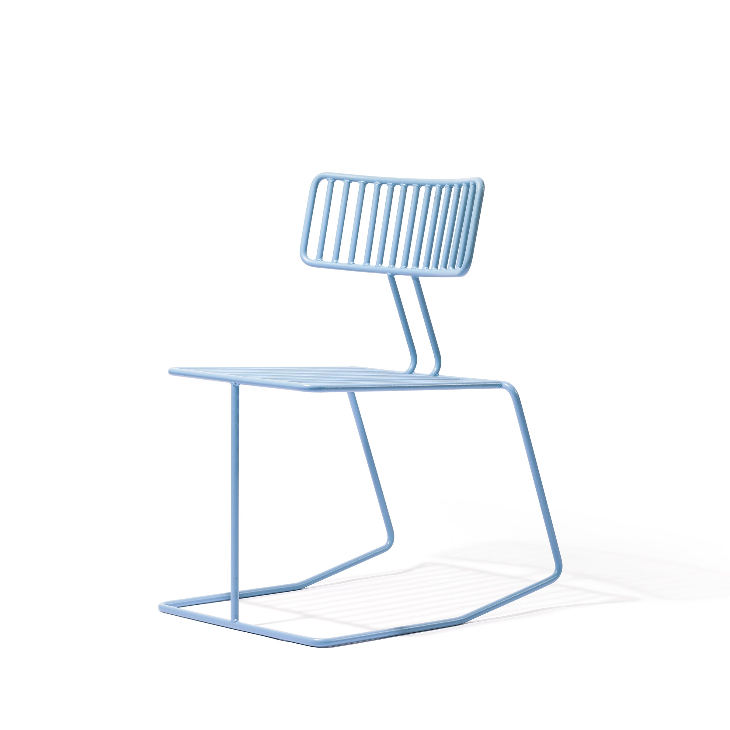 The Hope Chair by Egoe is a sleek, minimalist design with a light blue metal frame, vertical slats in the backrest, and uniquely angular legs that add elegance. It casts a soft shadow on the white background.