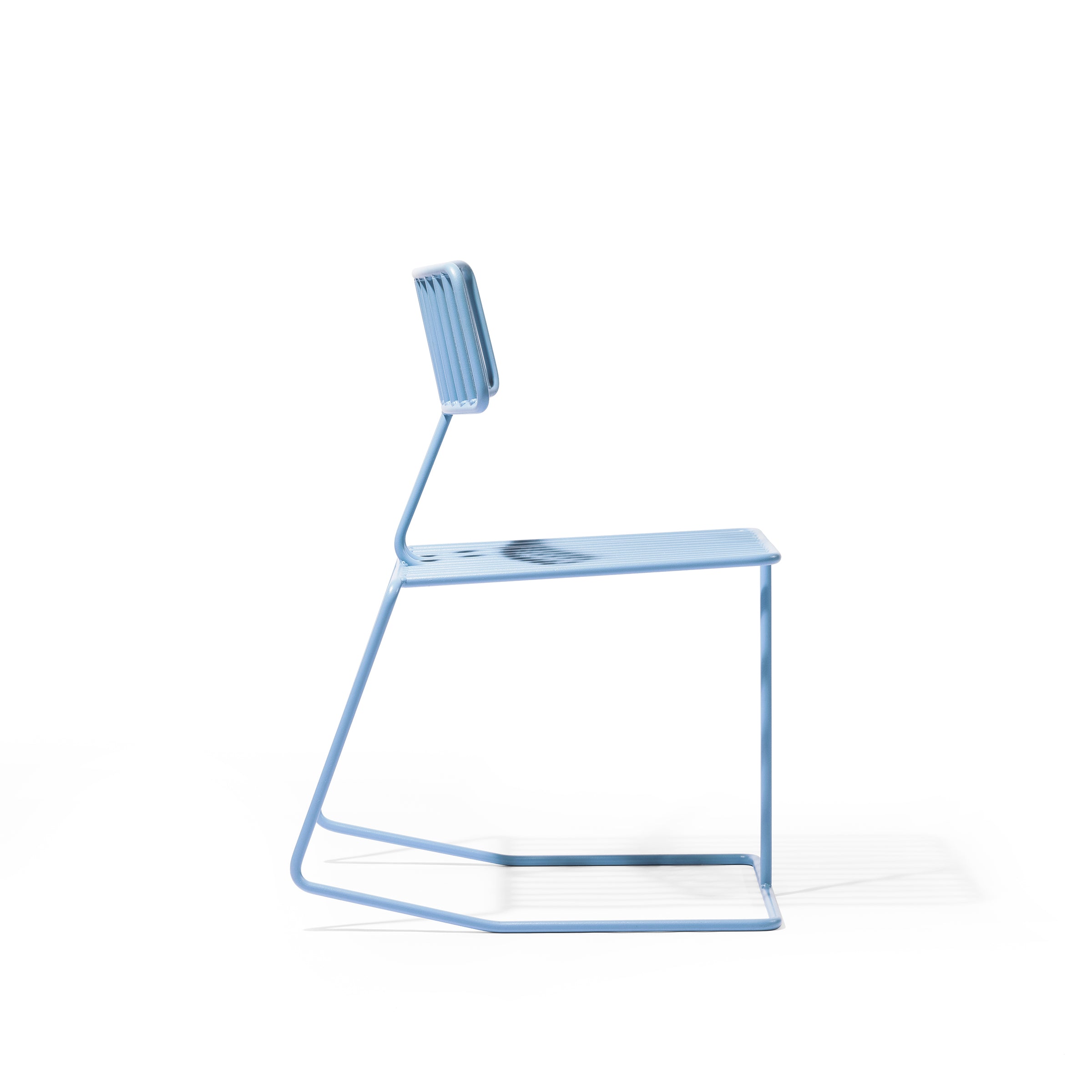 The Hope Chair by Egoe boasts a minimalist design with sleek lines, featuring a side view highlighting its light blue metal frame, flat rectangular seat, and narrow vertical backrest.