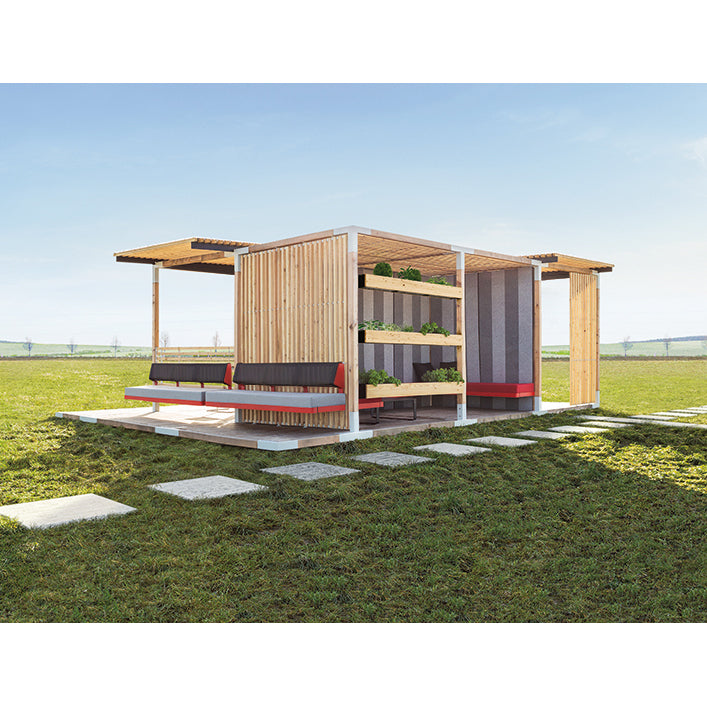 The Egoé Leva Office and Classroom is a modern outdoor pavilion with wood slats, a green roof, and open seating. It features greenery on shelves under a clear blue sky, set on grassy terrain with a stone walkway—a perfect blend of nature and design for an outdoor office setting.
