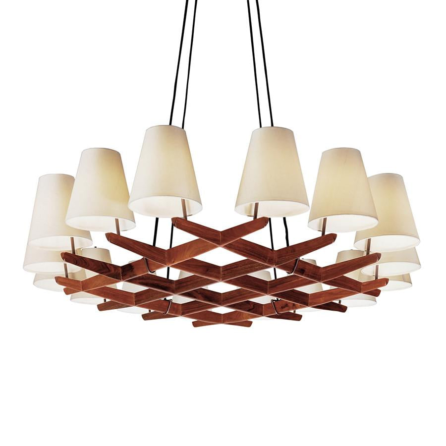 Introducing the Hallstatt by Kalmar: a geometric wooden chandelier with 12 white cone lampshades, perfect for entrance areas. Suspended by black cords, it effortlessly blends contemporary and classic design elements.