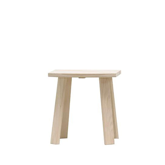 The Alpin Stool by Hussl features a rectangular seat and four straight legs, showcasing simple Alpine elegance.