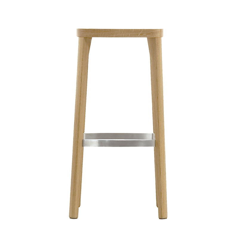 The ST6N-0 Barstool by Hussl is a minimalist Austrian coffee house stool featuring four light wood legs and a metal footrest, blending simple design with modern elegance.