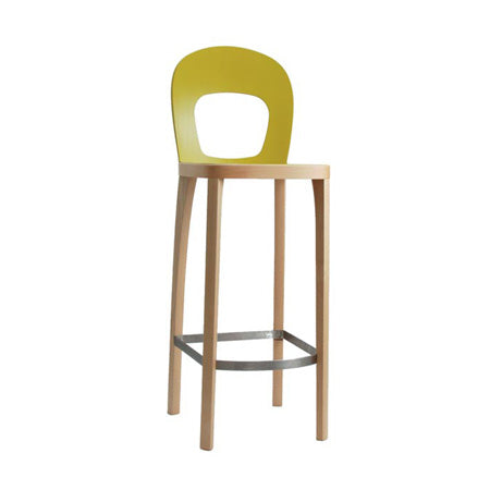 The ST6N-1 Barstool by Hussl is a wooden seat with a light brown finish inspired by Austrian coffee house style, highlighting a unique yellow circular cut-out backrest. It stands on four slender legs connected by a gray metal footrest.