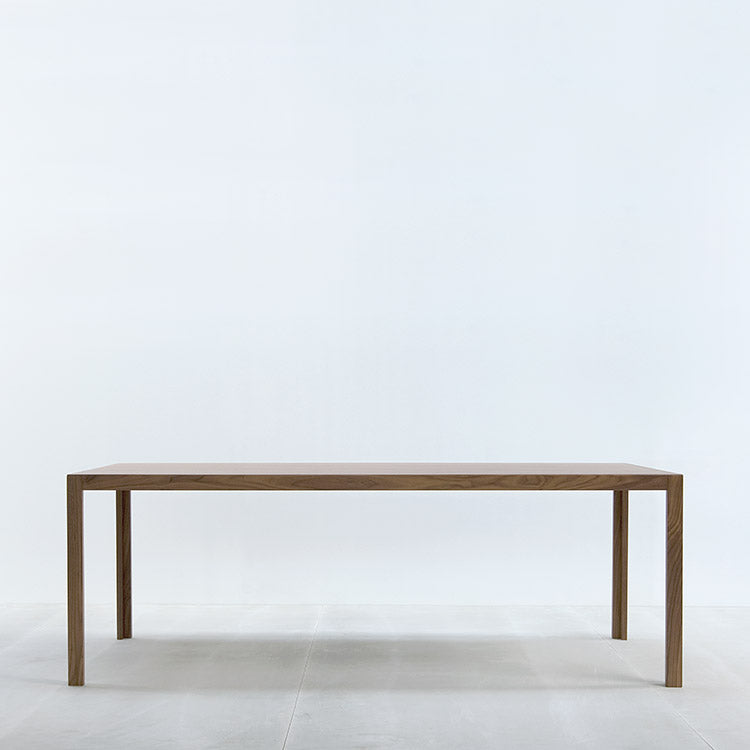 The Hussl TC10 is a minimalist wooden table featuring a smooth, durable surface and four straight legs. Its simple, modern design with clean lines and natural wood texture makes it perfect for contemporary business settings.