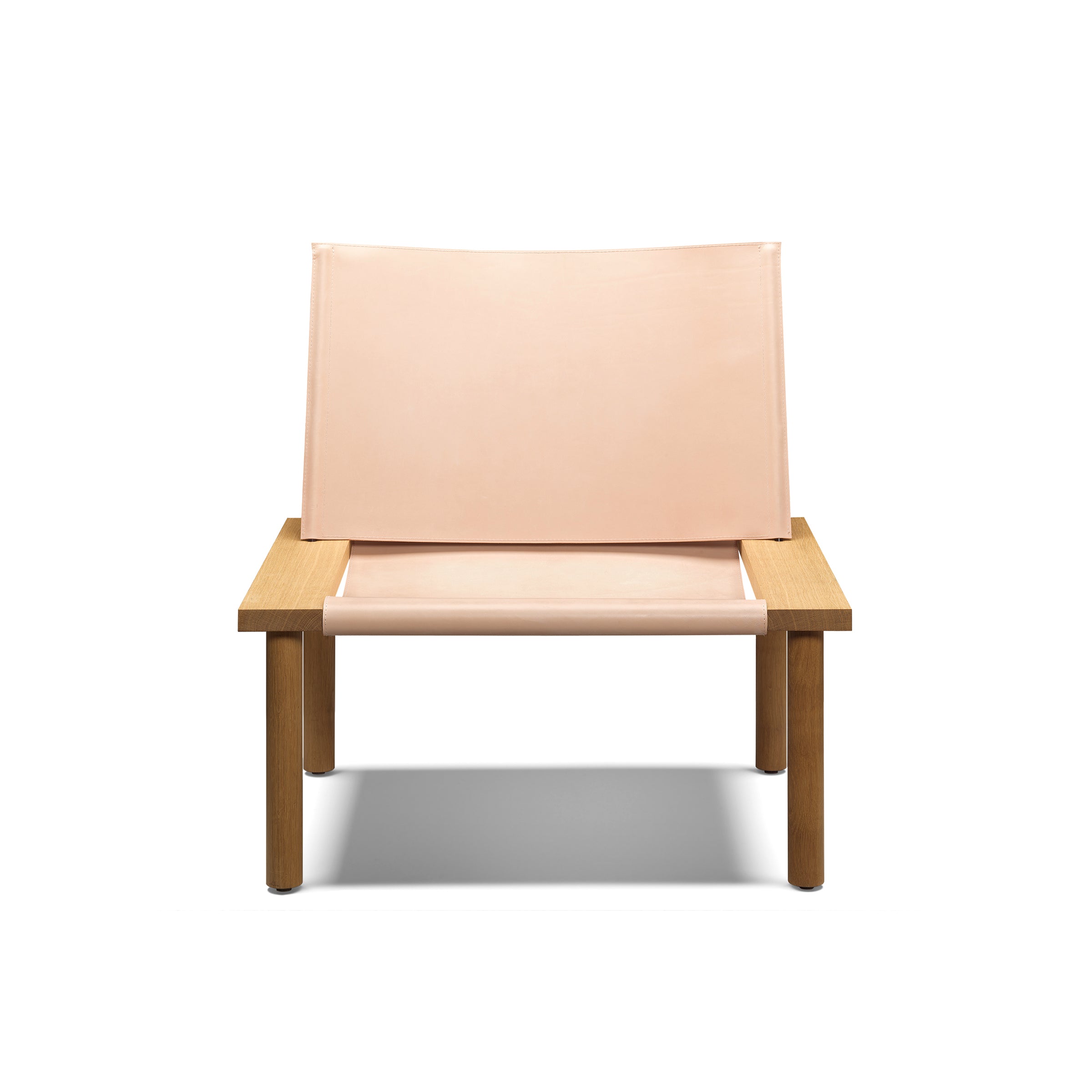 The EC06 ILMA Lounge Chair by E15 combines minimalist Scandinavian design with a light pink harness leather seat and backrest set on natural wood, all against a white backdrop.