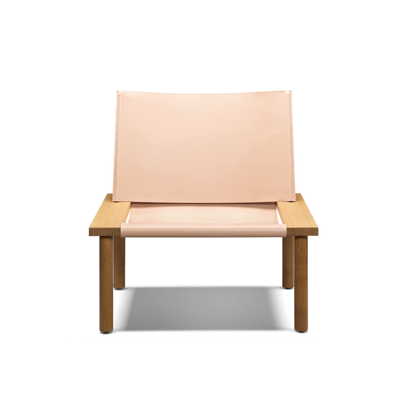 The EC06 ILMA Lounge Chair by E15 combines minimalist Scandinavian design with a light pink harness leather seat and backrest set on natural wood, all against a white backdrop.