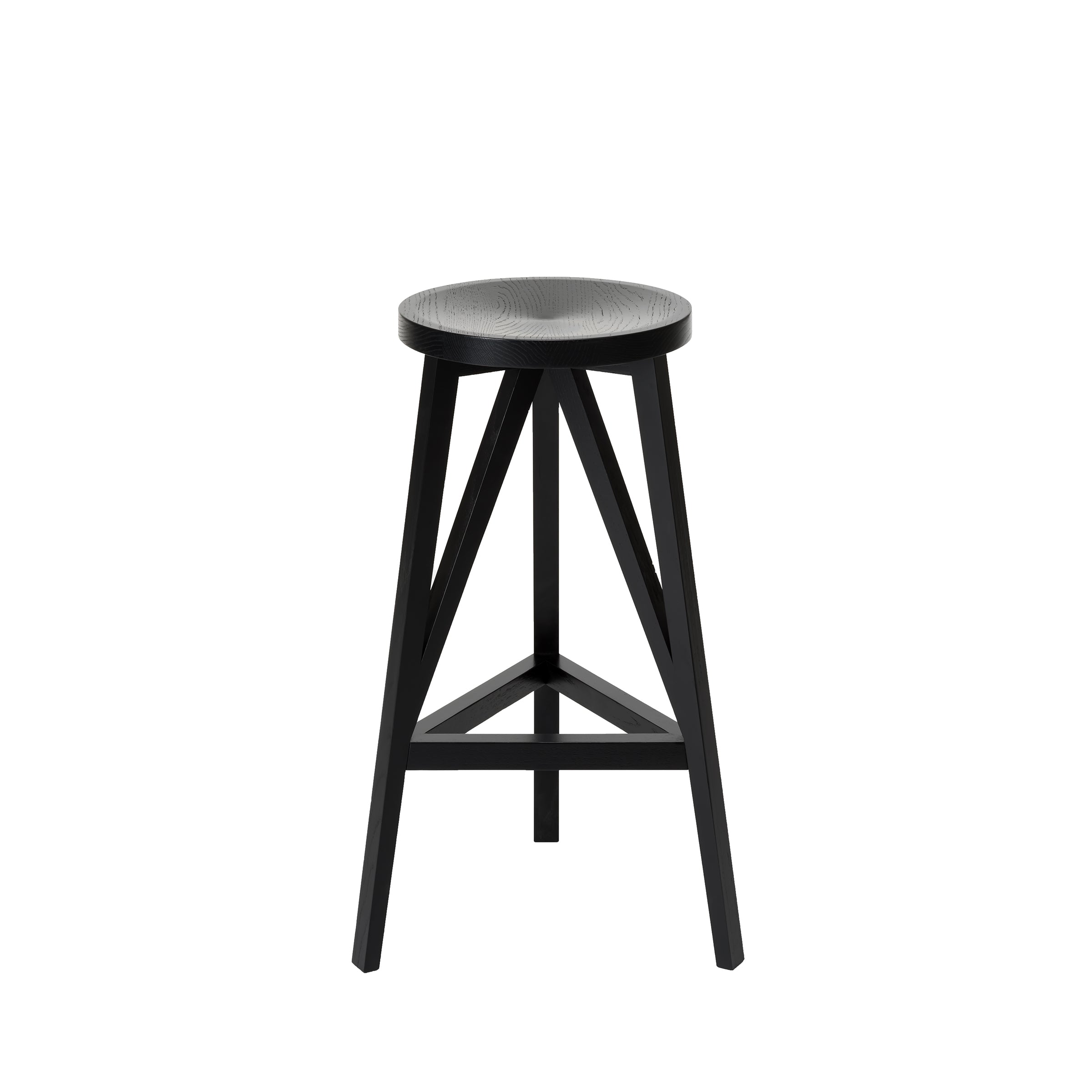 The JL4 Faber Barstool by Loehr features a modern, round black base with a solid oak seat and four legs connected by diagonal supports, showcasing a unique silhouette inspired by northern European architecture, set against a pristine white background.