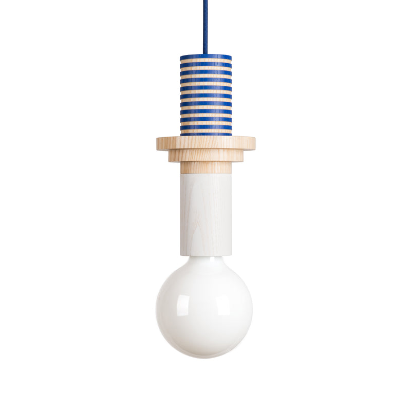 Presenting the Schneid Junit Column, a chic pendant lamp with a spherical white bulb. The fixture flaunts a striped blue and ash wood finish with stacked cylinders, and its elegantly suspended by a blue cord, making it ideal for modern spaces.