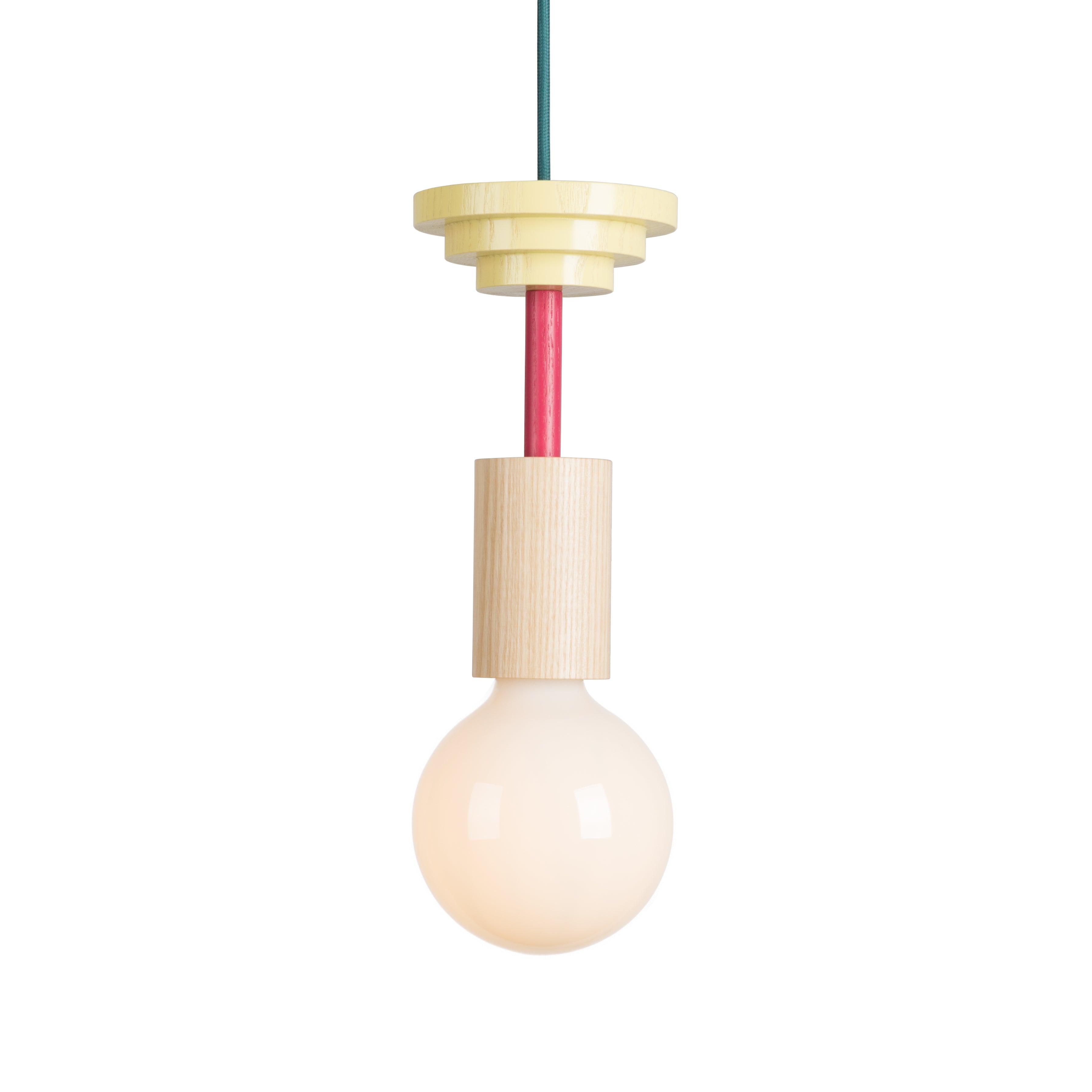 The Junit Mentis by Schneid is a modern modular pendant lamp with a round bulb and ash wood socket. A red and teal two-tone cord connects to a decorative light wood ceiling fixture, highlighting its innovative design against the plain white background.