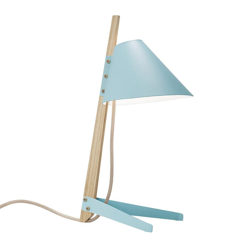 The Billy Table Lamp by Kalmar is a modern industrial design featuring a wooden base and lacquered metal shade. It includes a blue triangular support and beige power cord, focusing light precisely with its angled shade.