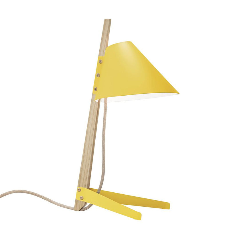 The Billy Table Lamp by Kalmar boasts an industrial design with a wooden stand and bright yellow cone shade. Lacquered metal elements enhance its sleek look, and a visible power cord extends from the base.
