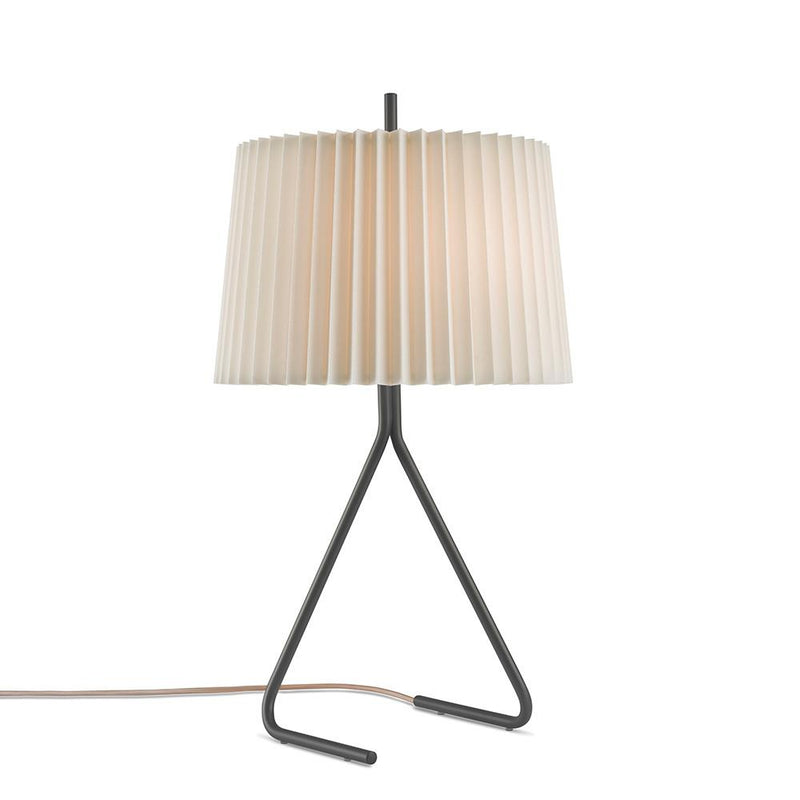 The Kalmar Fliegenbein TL table lamp offers a modern flair, with its minimalist black metal V-shaped base supporting a straight rod, a pleated silken shade, and a brown power cord, making it perfect for contemporary interiors.