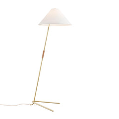 The Hase Floor Lamp by Kalmar is a minimalist piece featuring a sleek, angled brass stand and a white conical fabric shade inspired by Wiener Werkbund. It has a slender polished brass tripod base with the power cord extending against a plain white background.