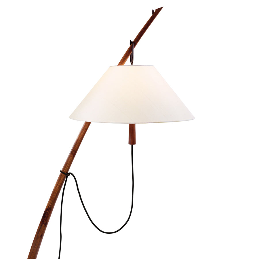 The Kalmar Dornstab Floor lamp features a curved wooden pole with a large, white cone-shaped fabric shade and a black cord, embodying a minimalist Wiener Werkbund design.