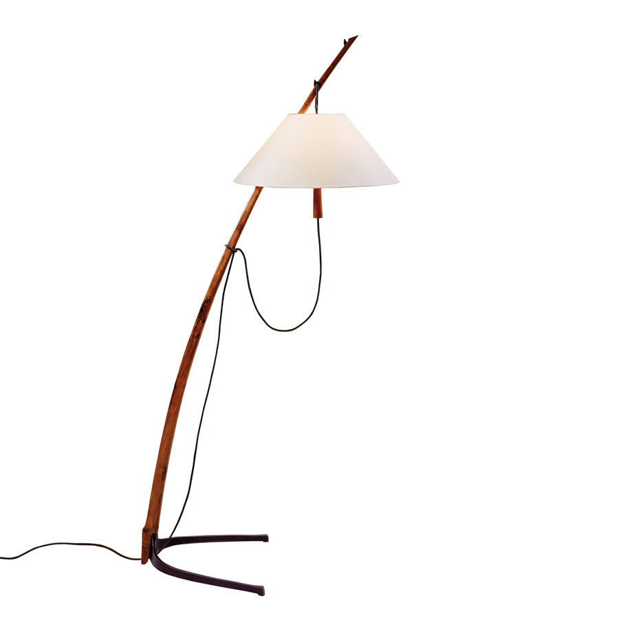 The Dornstab Floor by Kalmar is a contemporary freestanding luminaire featuring a slender wooden stand, white conical lampshade, and black cord. Its curved, minimalist design echoes the Wiener Werkbund style and elegantly sits on a dual-leg metal base.