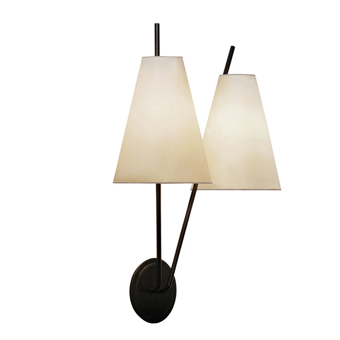 Kalmars Zweig is a modern wall lamp featuring ambient lighting with two cone-shaped white shades on black metal arms, mounted on a circular black base. The double sconce design highlights sharp angles and minimalist style for a contemporary aesthetic.