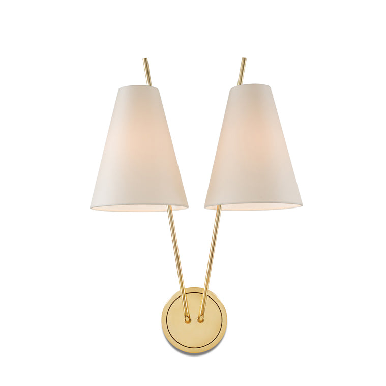 The Zweig by Kalmar is a modern double sconce with two textured silk cone-shaped white lampshades and gold-colored arms extending from a round base, forming a V shape. Its elegant and minimalist design offers perfect ambient lighting for contemporary interiors.