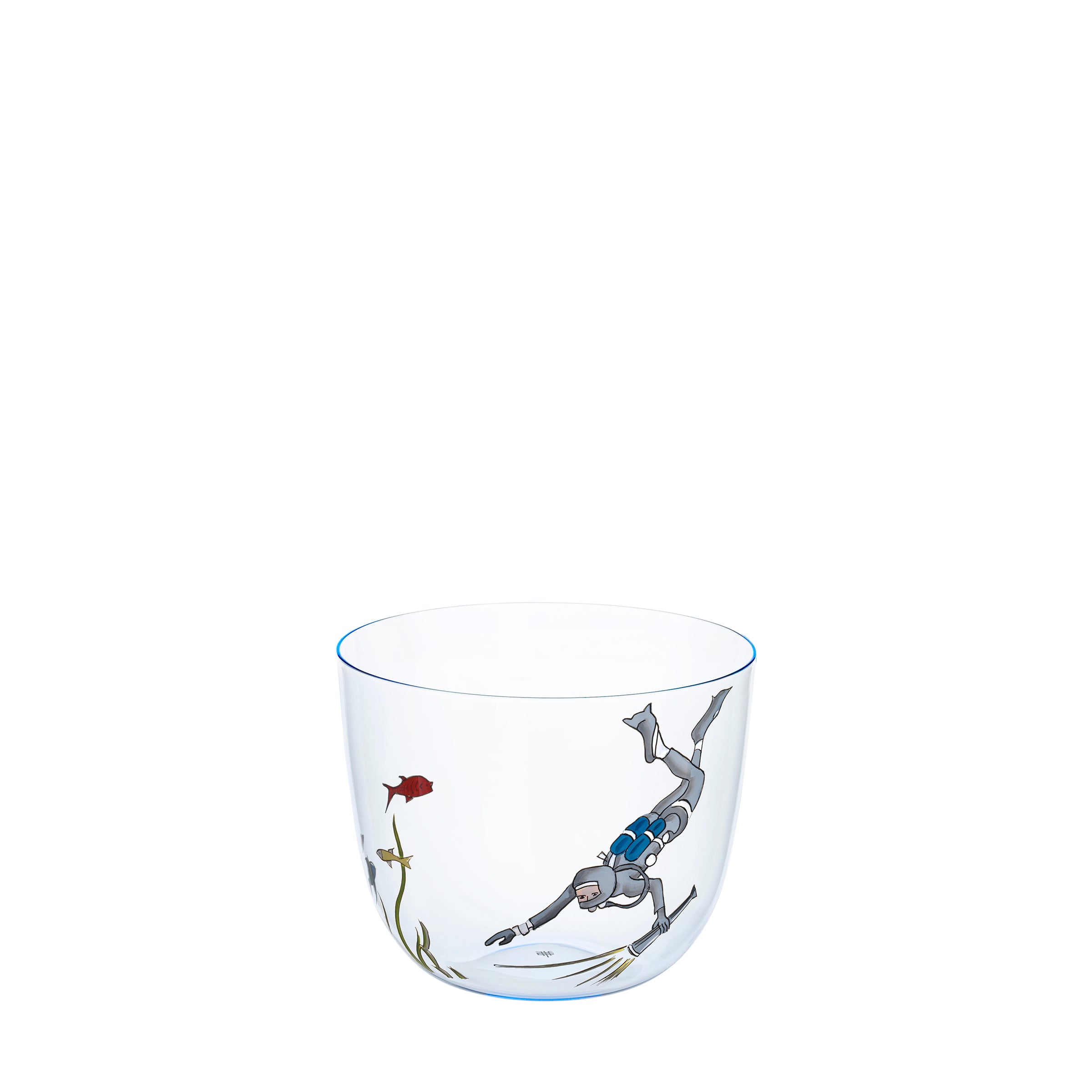The Lobmeyr Alpha High Seas tumbler is crafted from mouth-blown lead-free crystal, featuring a whimsical diver in scuba gear illustrated swimming towards a red fish and sea plants. It boasts a minimalistic charm with its clear glass and blue rim design.