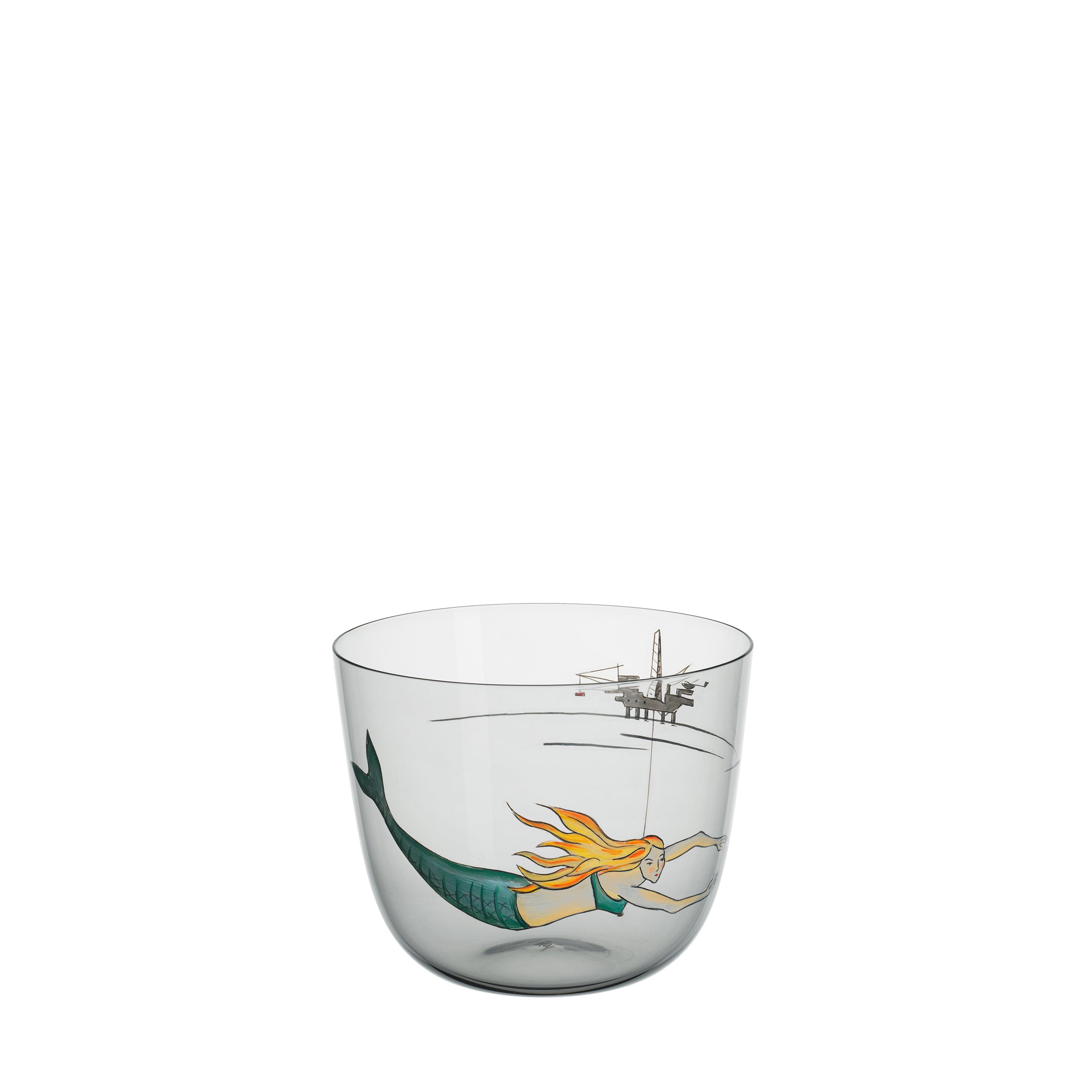 The Lobmeyr Alpha High Seas glass cup is a mouth-blown lead-free crystal, showcasing a mermaid with orange hair and a green tail swimming by an oil rig on the oceans horizon.