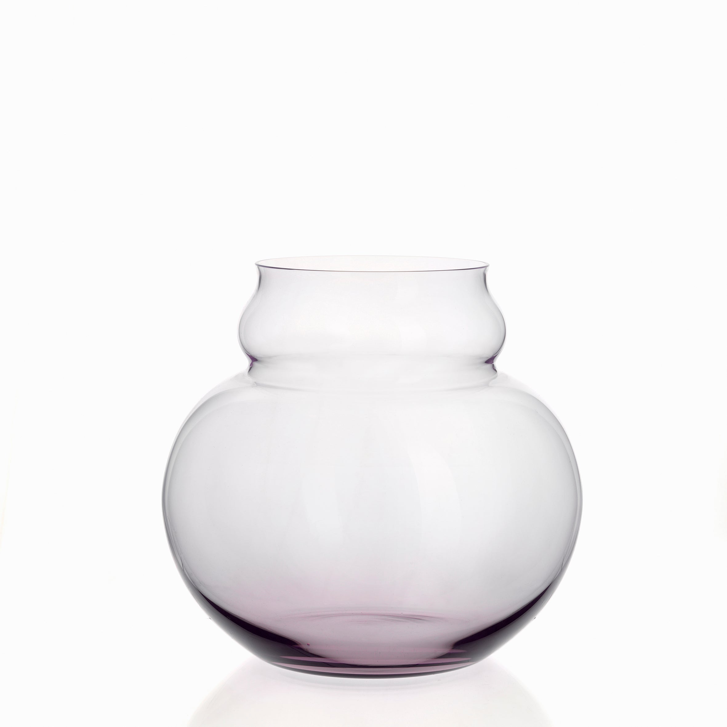 The Lobmeyr BV71 Calabash Flower Vase features a translucent, rounded design inspired by a gourd. It has a slightly narrower neck and is crafted from mouth-blown lead-free crystal with a subtle purple tint, set against a plain white background for an elegant look.