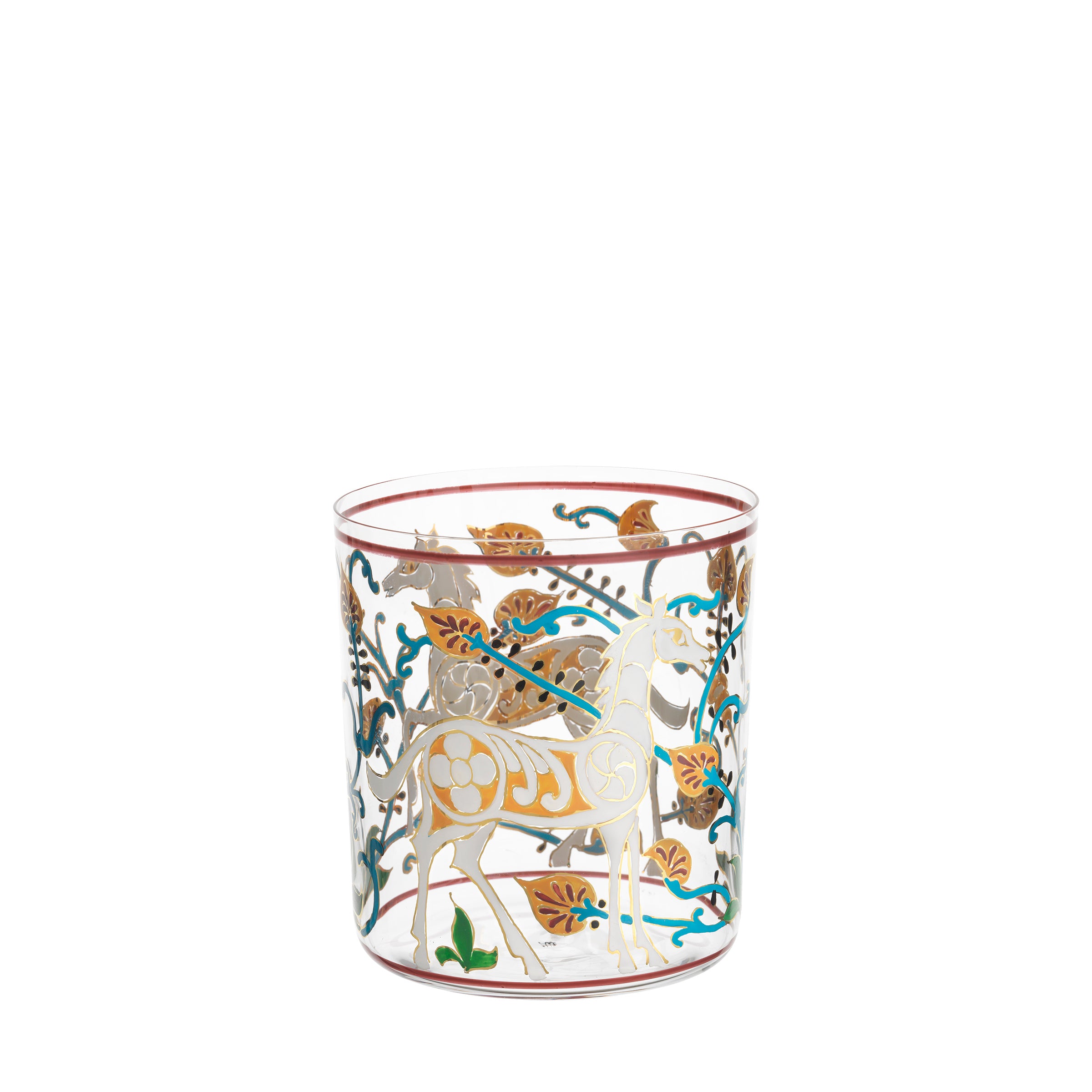 The Alhambra DOF Tumbler from Lobmeyr is a clear crystal glass adorned with intricate, hand-painted designs of colorful leaves and a patterned pale horse, evoking the elegance of an Alhambra palace in its artistic style.
