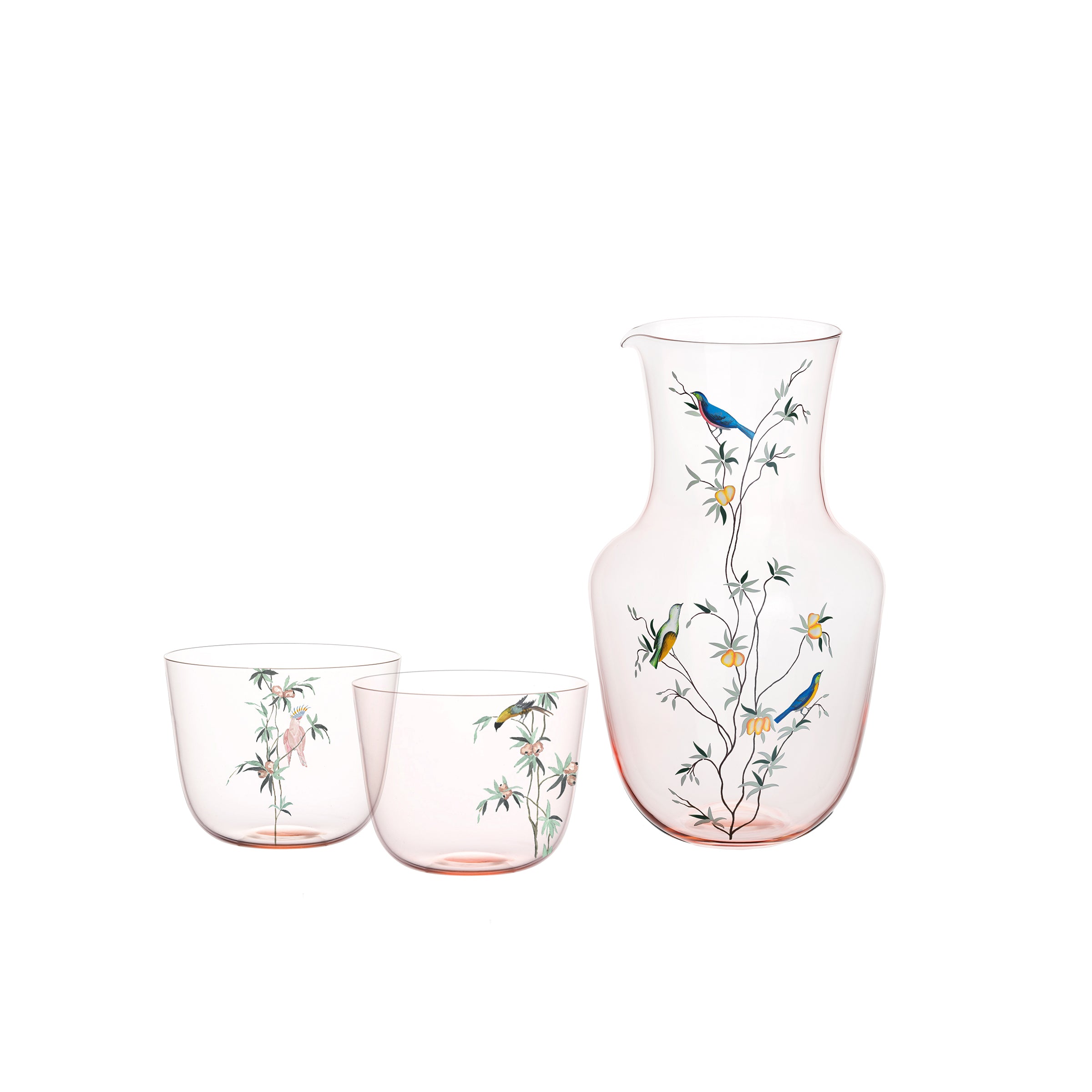 Experience the Garden of Paradise with Lobmeyrs Alpha Pitcher and coordinating hand-painted tumblers, featuring delicate bird and tree branch designs in a soft pink rosalin hue.