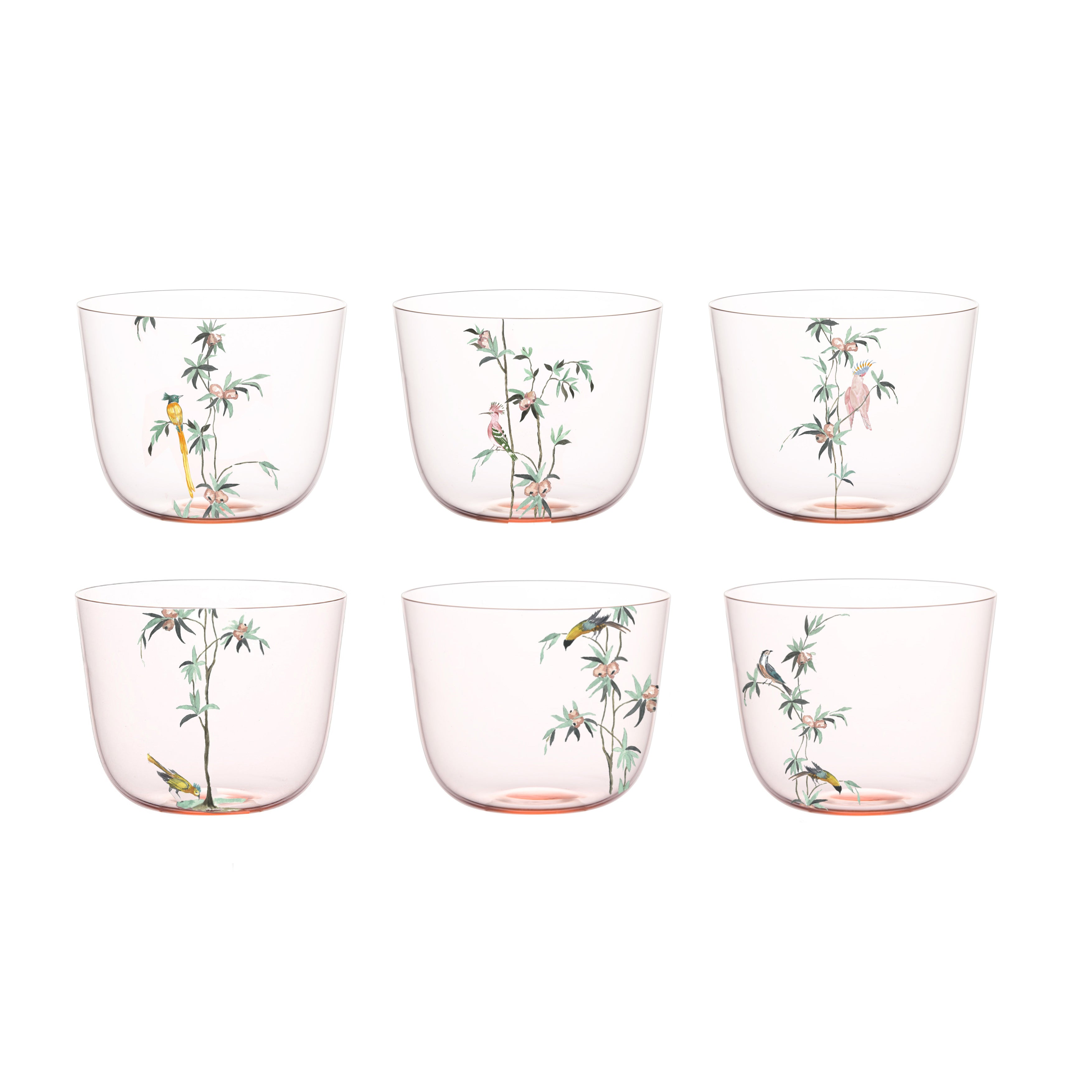 The Lobmeyr Alpha Water Tumbler - Garden of Paradise set includes six transparent glass cups with intricate hand-painted floral and bird designs, featuring green leaves, branches, and exotic birds arranged in two rows.