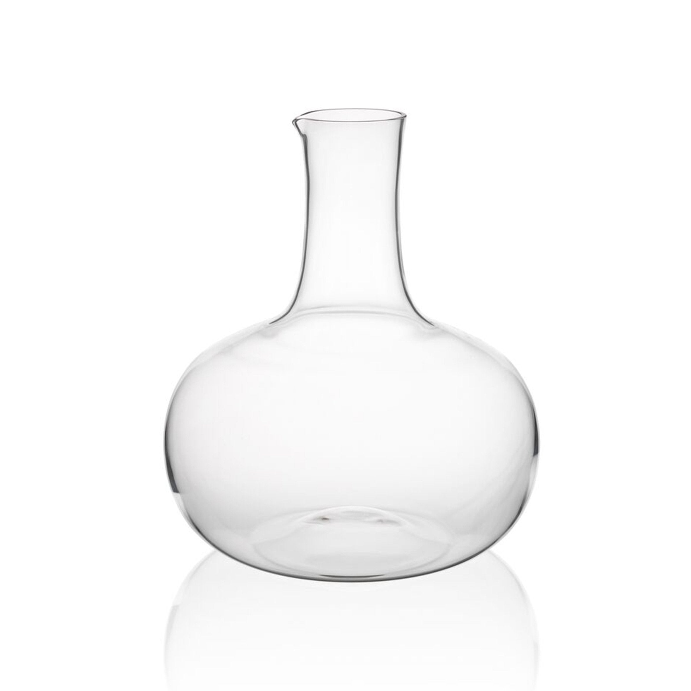 The Lobmeyr Drinking Set No. 286 - Normal-Special includes a clear, glass decanter made from mouth-blown lead-free crystal. It features a wide, round body and narrow neck with a smooth, polished surface that reflects light subtly, making it an elegant addition to any universal drinking set.