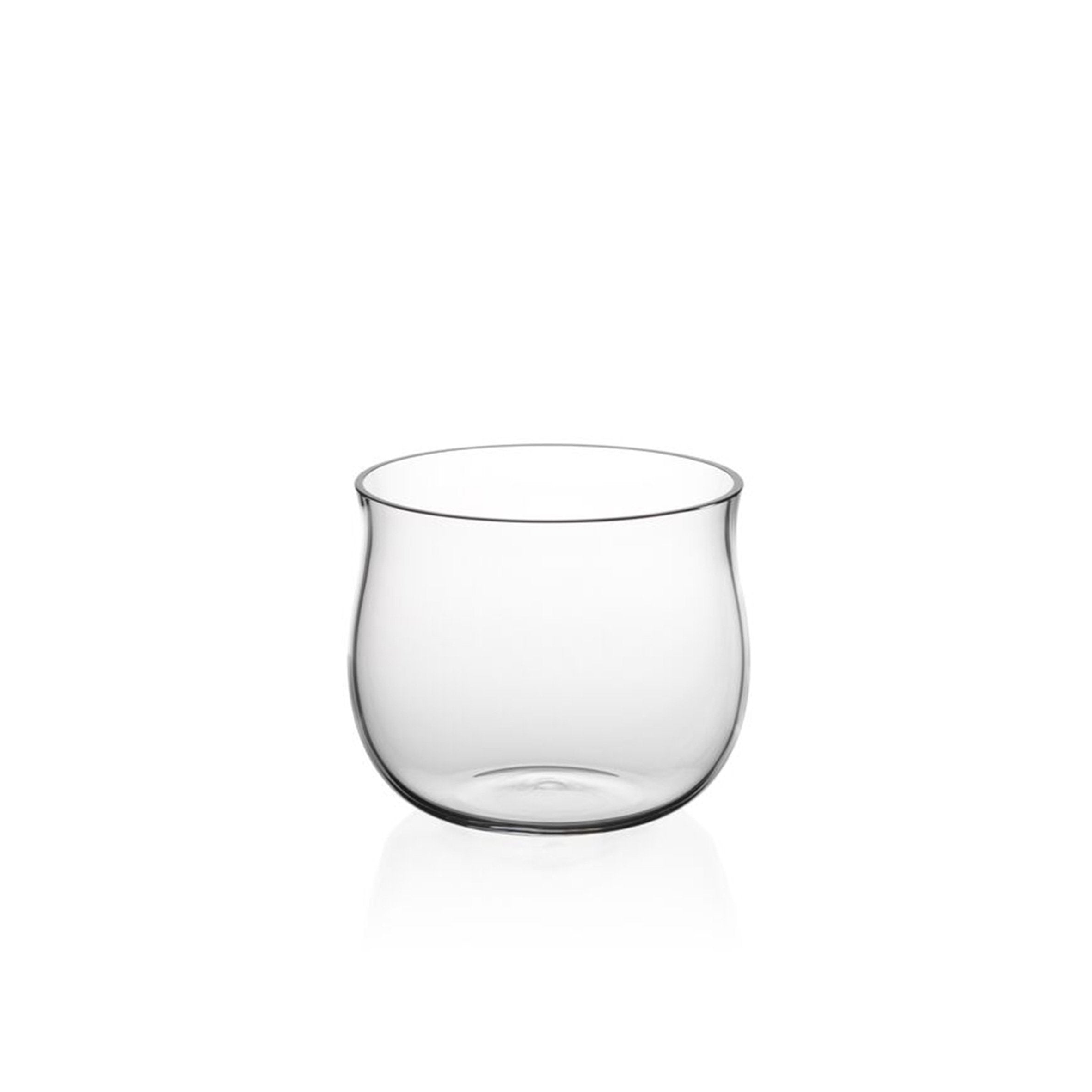 A clear, round glass tumbler from Lobmeyrs Drinking Set No. 286 - Normal-Special is crafted from mouth-blown lead-free crystal with a slightly curved, organic shape. It rests on a plain white background, emphasizing simplicity and elegance—perfect for any universal drinking set.