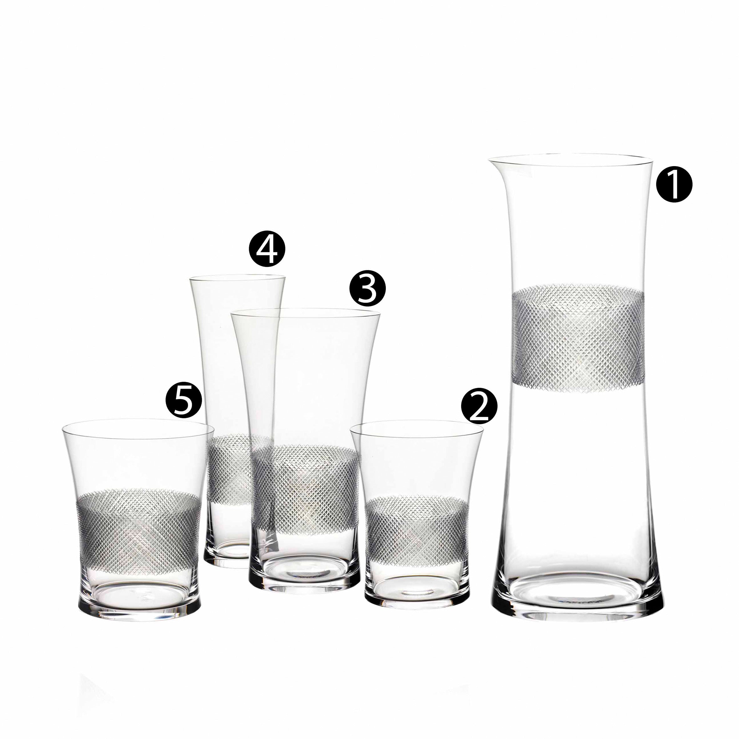 The Drinking Set No. 282 - Diamond Cut by Lobmeyr includes five clear glass pieces with silver textured bands: a tall carafe, two medium glasses, and two shorter glasses, arranged from tallest to shortest and inspired by Ted Muehlings Lobmeyr designs.