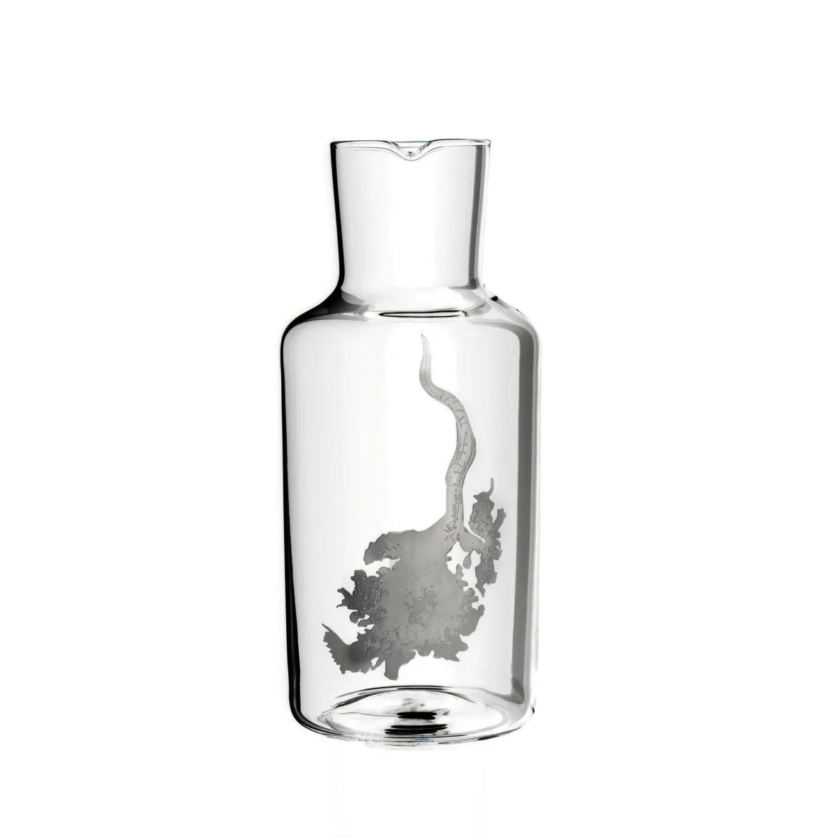 The Fortune Series by Lobmeyr is an elegant, mouth-blown crystal water carafe featuring a distinctive snake motif etched on its smooth, cylindrical surface. Its slightly narrower neck and flat base make it perfect for any table setting.