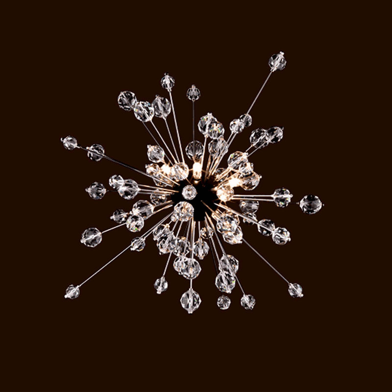 The Mini Sputnik from Lobmeyrs The Met Series features Swarovski crystal spheres on slender rods against a dark background. Reminiscent of Hans Harald Raths Starburst Chandeliers, it resembles an exploding star or fireworks with radiant lights among clear crystals.