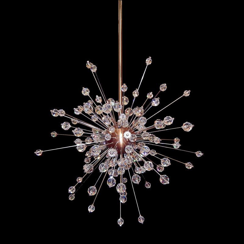 The Mini Sputnik from Lobmeyrs The Met Series, now on sale, features a central metallic hub with thin rods ending in crystal-like ornaments, resembling Hans Harald Raths starburst chandelier designs against a black background.