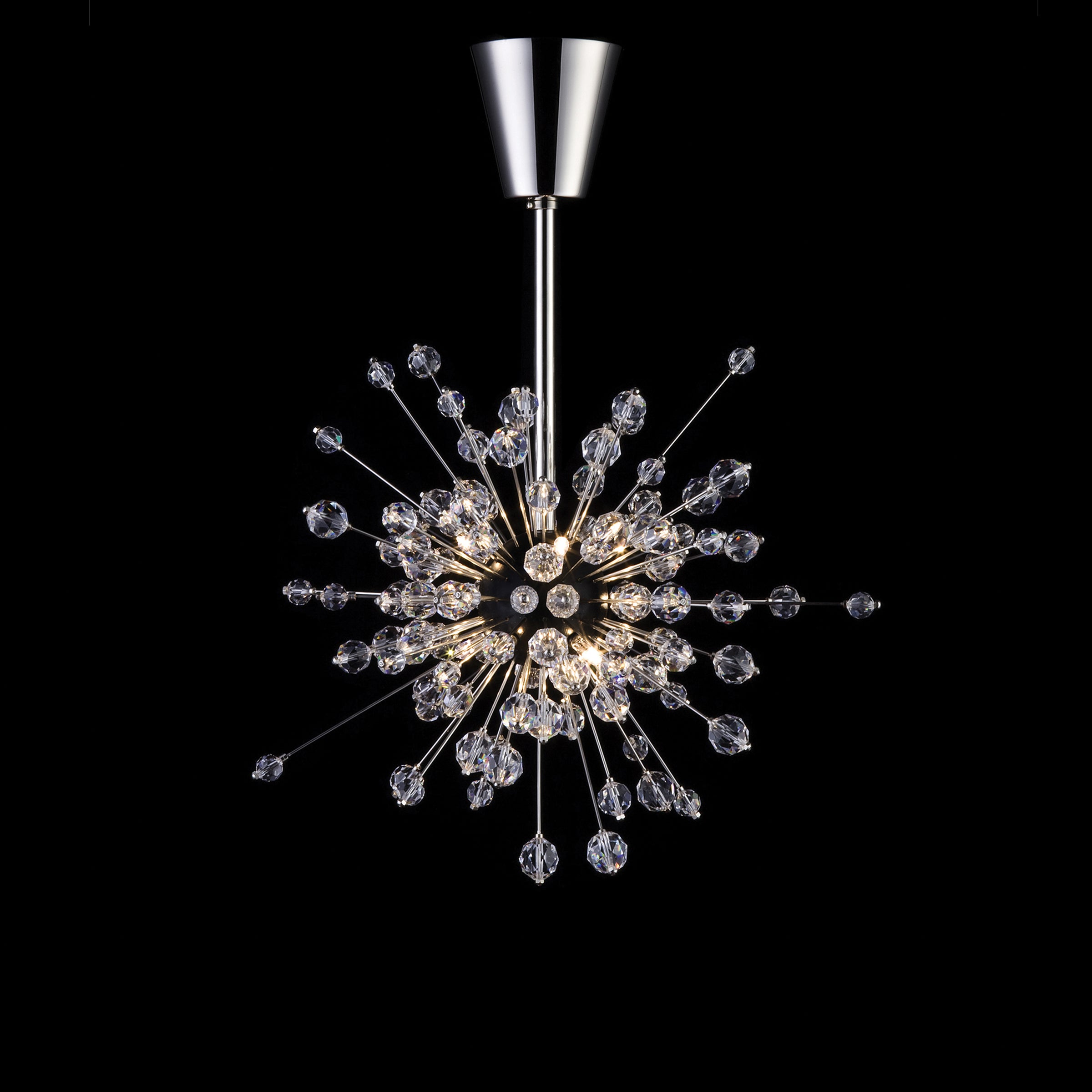 Discover the Mini Sputnik from The Met Series by Lobmeyr, featuring a central metal sphere with extending rods like cosmic rays. Adorned with jewel-like decorations reminiscent of Swarovski crystals, this elegant piece stands out against a dramatic black backdrop.